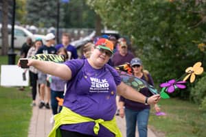 Home Woman participating in a fundraising walk.